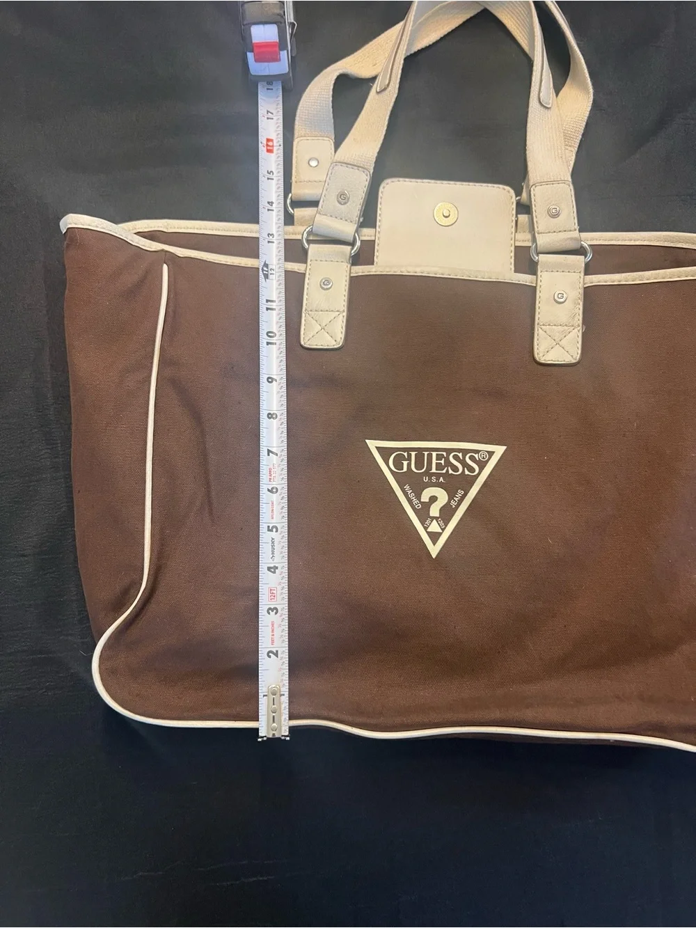 Guess brown logo